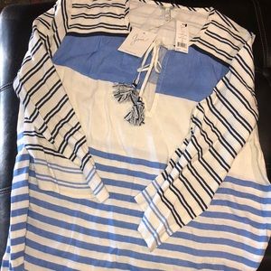 Brand new. This would make an adorable cover up!